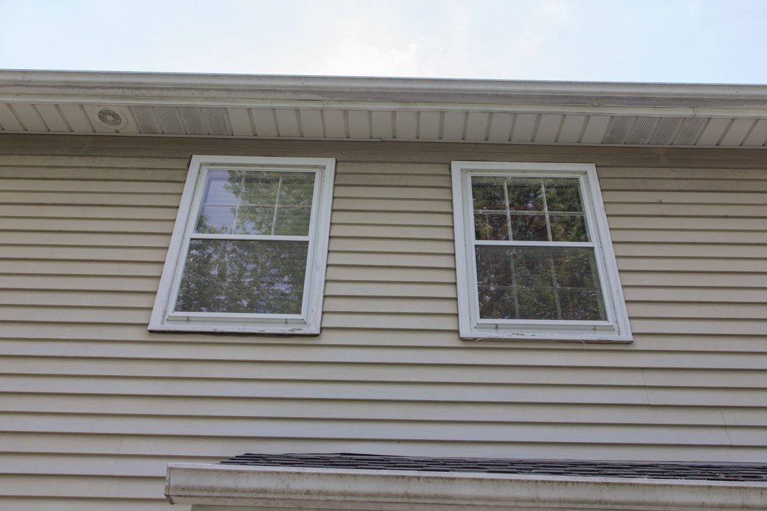 Close up of siding and windows aging - before pic