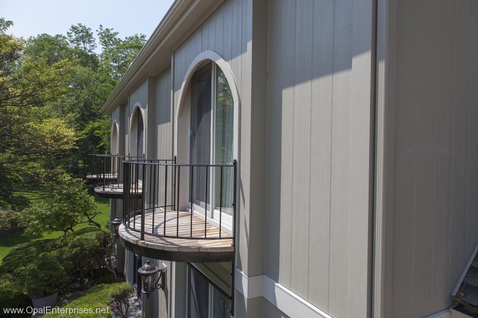 Unique home with Vertical Siding Hardie Panels, Andersen Arch Window