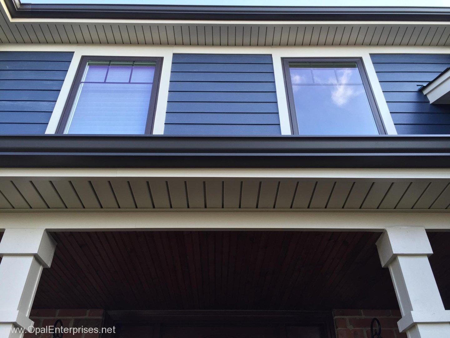 Deep Ocean James Hardie Siding paired with Andersen 100 Series Windows