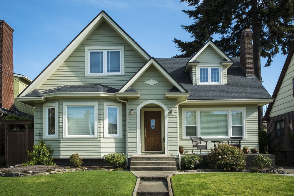 craftsman-style home with various window sizes and shapes