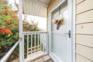 A home with a new storm door. Find out how much it costs to install storm doors in Illinois.