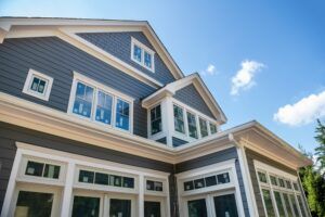 A house with a lot of new windows. You can explore new construction vs. replacement windows to decide which is better.