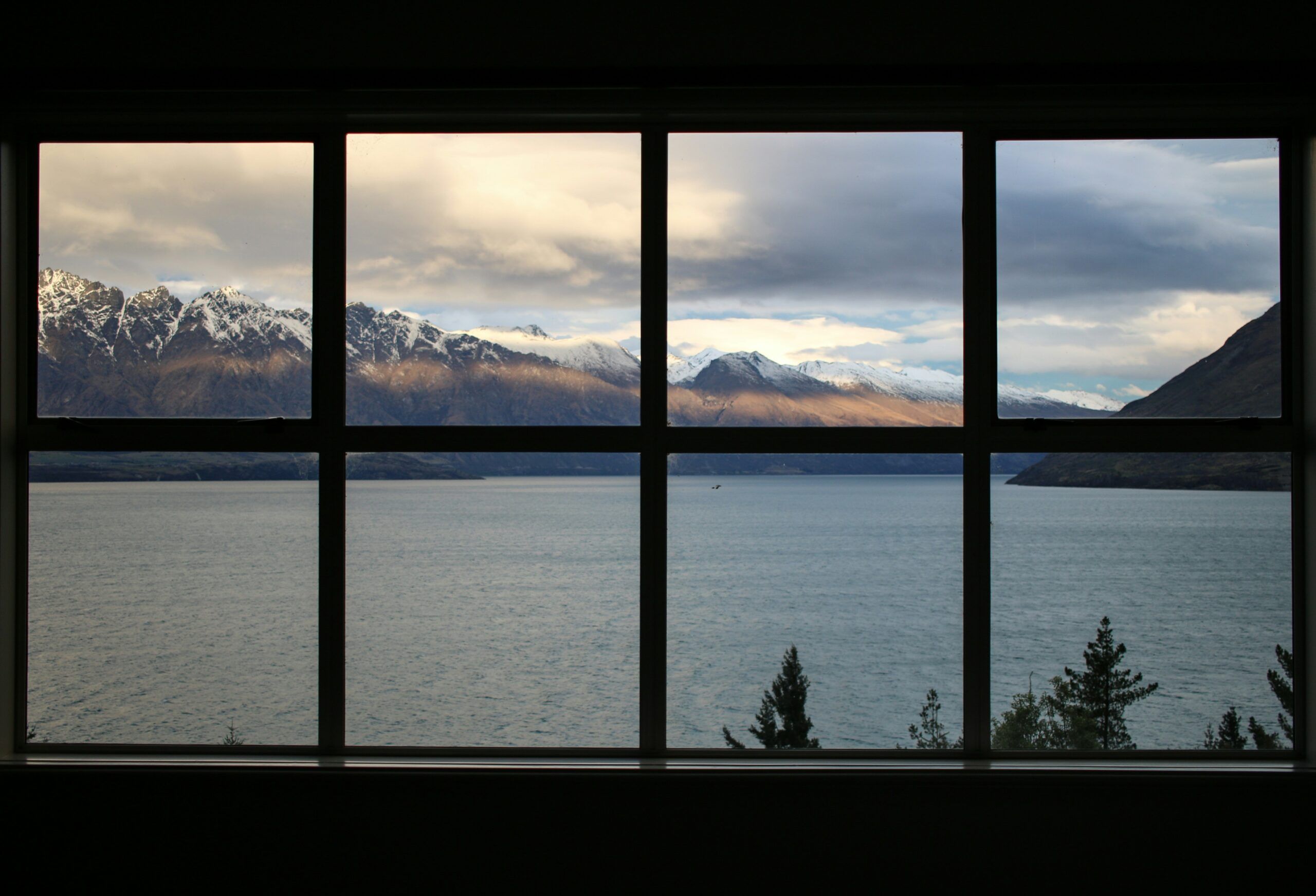 Energy-efficient windows in Naperville: A giant window faces a mountain massive with snow on the tops.